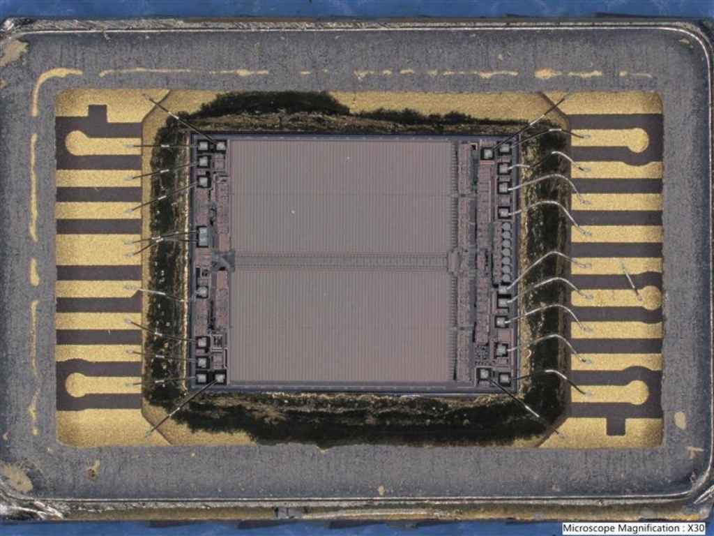 dye inspection showing an image of bond wires and dye at 1500x under the lid of a semiconductor during counterfeit mitigation testing